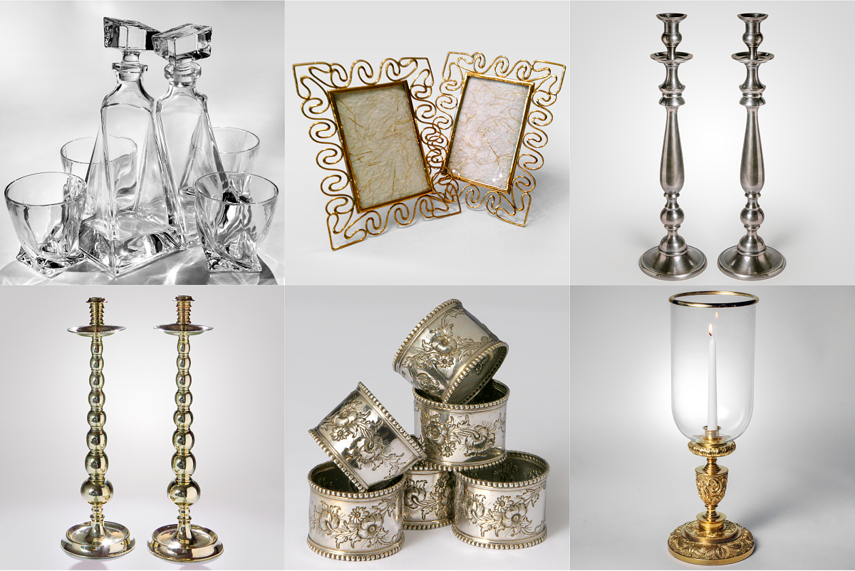 CRYSTAL DECANTER SET, PAIR OF BRASS PICTURE FRAMES, SMALL PEWTER CANDLESTICK, ENGLISH BRASS CANDLESTICKS, STERLING NAPKIN RINGS, BRASS AND GLASS HURRICANE