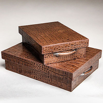 A SET OF LEATHER BOXES