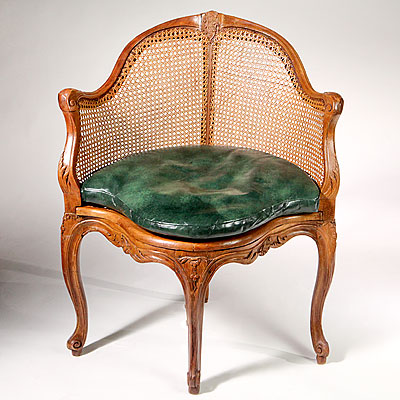 CANED CORNER CHAIR