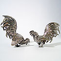 PAIR OF SILVER ROOSTERS