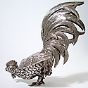 PAIR OF SILVER ROOSTERS