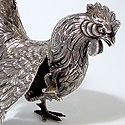 PAIR OF SILVER ROOSTERS