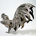 PAIR OF SILVER ROOSTERS